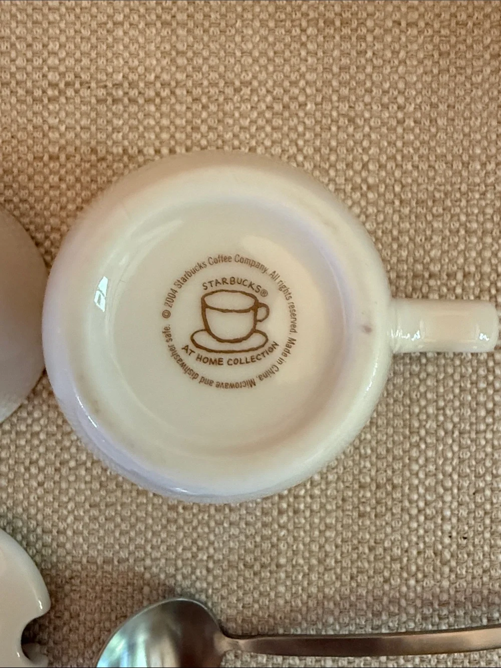 Starbucks White Ceramic Sugar Bowl and Creamer Set with spoon.
